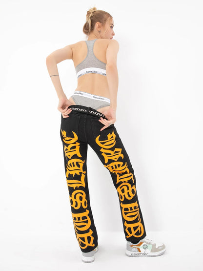 Burning Text Embroidered Letter Jeans worn by the model